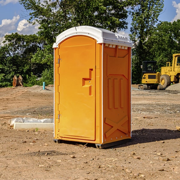 how often are the porta potties cleaned and serviced during a rental period in Adams